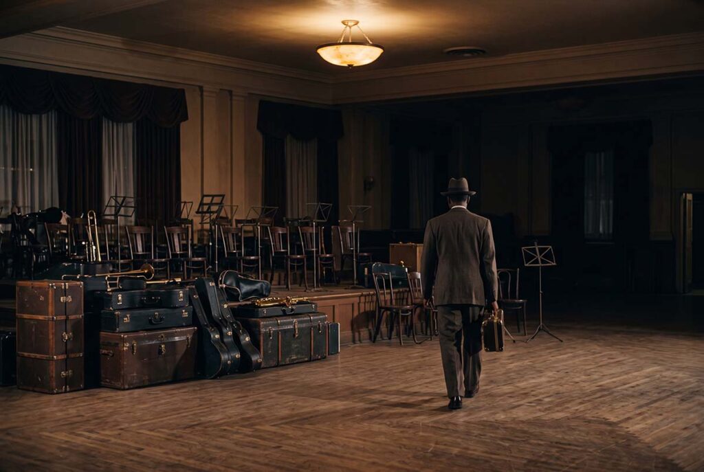 An empty wartime swing ballroom reflects the economic pressures that weakened the large-orchestra recording model.